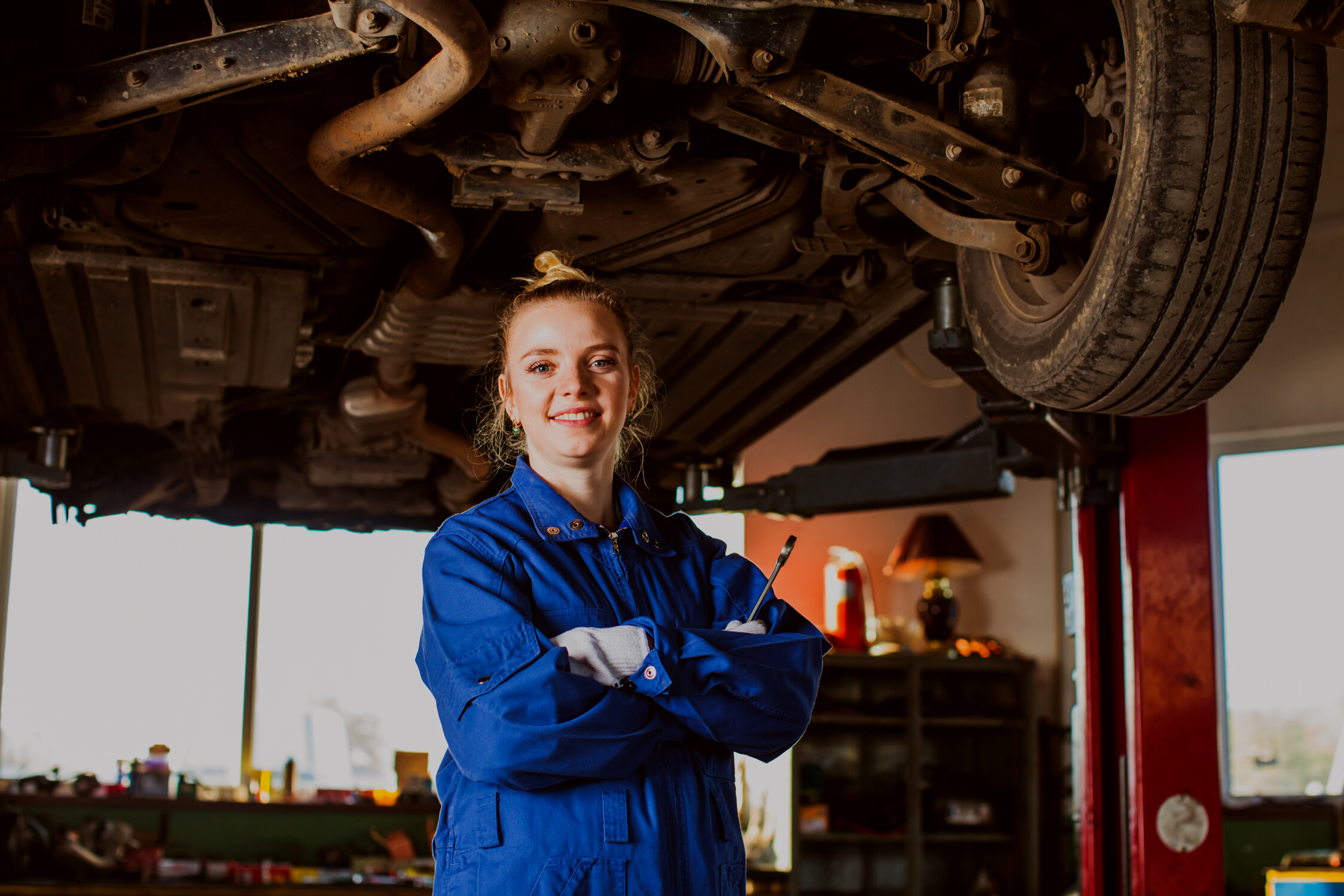 Confident Smiling Auto Mechanic Woman